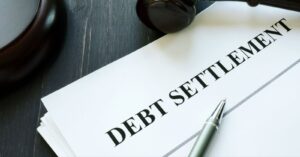 What Is Debt Settlement?
Debt settlement, also referred to as legal debt resolution, is the process of negotiating a speedy and affordable debt reduction with your creditors. Not only does debt settlement aim to pay off the exorbitant interest rates that commonly accompany minimum payments, but it also aims to reduce the principal amount of your debt.

Debt settlement is more than a straightforward scheme or initiative. It's an aggressive and specialized financial plan meant to successfully pay off debt. We can help you get debt-free sooner and save more money than alternative repayment choices by negotiating directly with your creditors.

