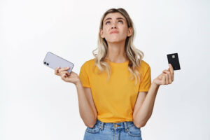 Woman comparing credit card options